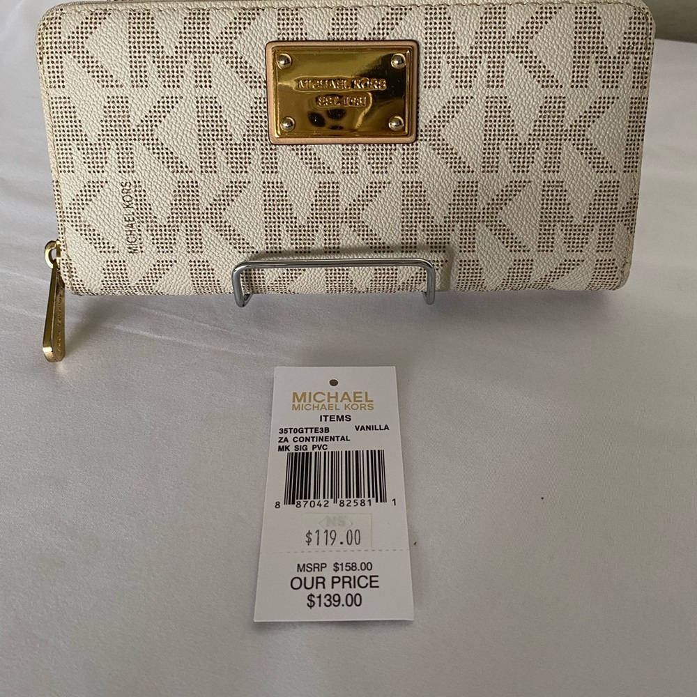 Michael Kors Continental MK Signature Wallet.  Vanilla Color with gold trim.